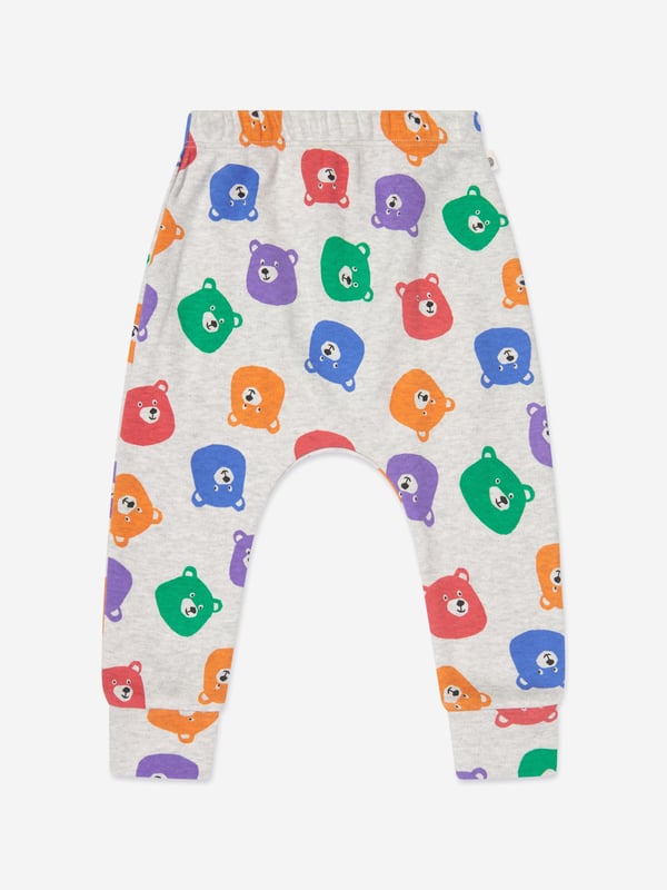 The Bonnie Mob depict passion and colour into their eco-friendly, sustainable abstracts. These baby unisex Harem trousers are depicted on a light grey base with teddy bear patterning in soft cotton via an elastic waist and ribbed cuffs for a cute versatile feel.  100% GOTS Certified Organic Cotton GOTS Certified Organic Brand Cotton Jersey
