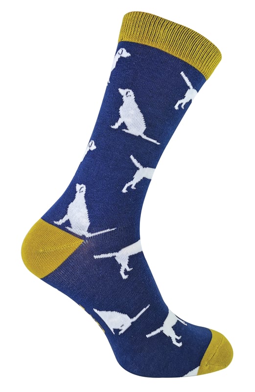 MR HERON MENS DOGGY SOCKSLooking for socks that show your love for mans best friend? Well you can now get your onw socks with all kinds of dogs on them, brought to you by Mr Heron socks. These socks are a cute gift for any man who loves dogs. You can choose between a Labrador, Jack Russell, Dalmatian or Sausage Dog pattern in four different colours.Not only are these socks super cute, they are also super soft with several features to enhance the comfort of the sock.Firstly, the high bamboo content makes the sock superior to your normal cotton sock, wicking any excess moisture away from the foot and enhancing softness in general. Bamboo is also a sustainable fibre.A cushioned heel and comfort cuff at the top of the socks enhances comfort further. These socks feature a fun colourful heel and toe design.They are made from 54% Bamboo, 22% Cotton, 16% Polyester, 6% Nylon, 2% Elastane.These socks are available in 6-11 UK and are safely machine washable. Do not dry clean, Do not iron, Do not bleach.Extra Product Details- Mens Dog Socks- Novelty Socks- Ideal Gift- Bamboo Socks- Super Soft Touch- Coloured Toe and Heel- 6-11 UK