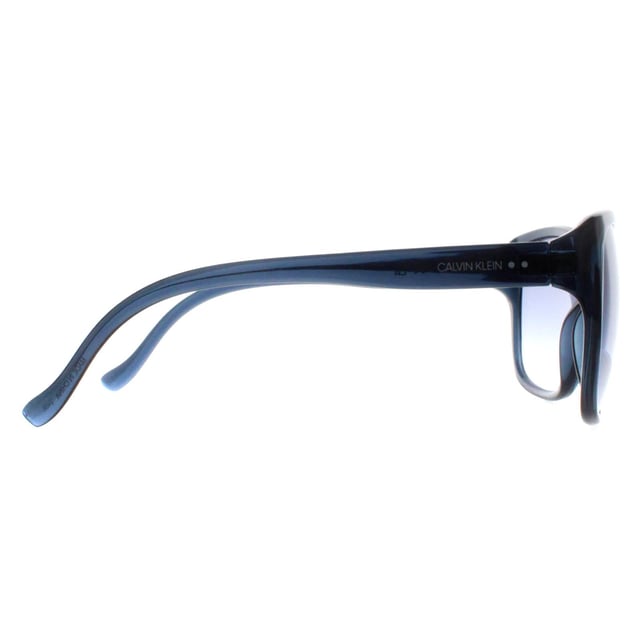 Calvin Klein Butterfly Womens Crystal Navy Navy Gradient CK20518S  Sunglasses are a classic butterfly style crafted from lightweight acetate. The slender temples feature the Calvin Klein logo for authenticity.