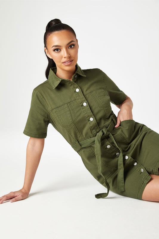 The perfect day out mini dress featuring a flawless fitted silhouette with a button and tie waist fastening. The ideal dress for a night out with friends to a holiday centrepiece, this dress will quickly become your favourite. Model is 5'6 and wears a size 8.