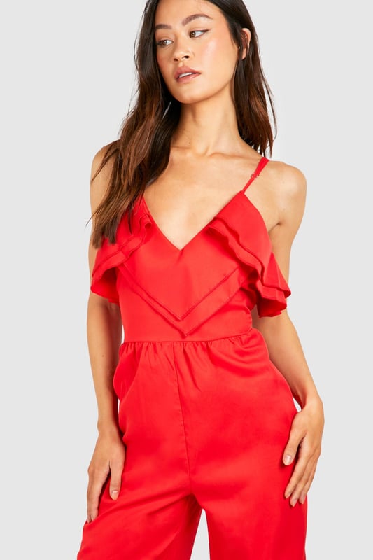 Cut those mornings in half with the help of a tall playsuit or jumpsuit from our latest arrivals. When the temperature rises, we've got playsuits for tall ladies, seen in fresh florals, ruffle sleeves and colourful prints. Take on the night in a tall jumpsuit, we're loving lace trims, plunging necklines and cut-out details. For all girls 5'7" and over, a long length jumpsuit for tall women is the effortless piece you need.Style: Wide Leg JumpsuitFabric: PolyesterLength: RegularNeckline: WrapSleeve Length: Strappy