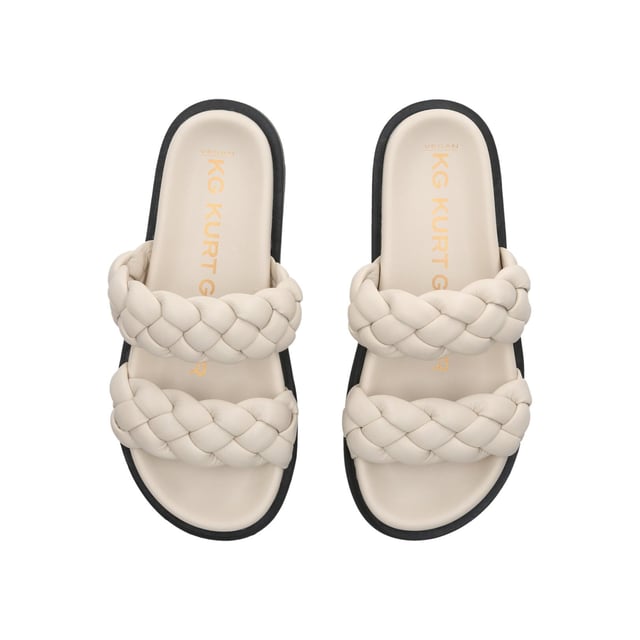Slip into the KG Kurt Geiger Rath sandal this season. This bone sandal features two braided effect straps securing the foot above the curved footbed. The stepped sole is in a black flatform style.