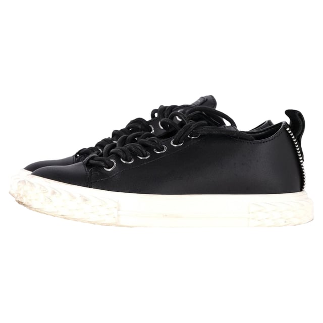 VINTAGE, RRP AS NEW
Elevate your footwear collection with the sophisticated and contemporary design of the Giuseppe Zanotti Blabber Low-Top Sneakers. Crafted from luxurious black leather, these sneakers exude a bold yet refined style. The sleek, minimalistic silhouette features clean lines, ensuring versatility for any casual or semi-casual outfit.

 Giuseppe Zanotti Blabber Low-Top Sneakers in Black Leather

Condition: Very good
Signs of wear:  Minor markings, Lightly used but very well maintained. Minor mark at soles & creasing, light scuffing at the soles and heels.
Packaging: Dust bag
Color: Black
Material: Leather | leather
Size: IT | 36/UK3/FR37/US6
Measurements: Heel height: 30; Insole length: 280
SKU: TONPUGBSH444358W