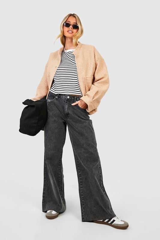 Keep things casual but always on-trend with a piece of outerwear perfection, the bomber jacket. A light jacket featuring a gathered, ribbed waistband and matching cuffs, a bomber jacket is versatile, timeless, and the perfect way to edge up your casual wear. Wear your new women's bomber jacket with a shirt and stripe joggers for the hottest look of the moment: sports luxe, or layer a varsity jacket over a t shirt dress for a fresh new-season look.Style: Bomber JacketFabric: Wool LookLength: RegularSleeve Length: Long Sleeve