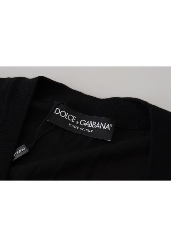 100% authentic Dolce & Gabbana cardigan sweater
  Crafted from Quality wool
  Classic black color
  Full button closure
  Logo details
  Made in Italy
  Material: 100% Virgin Wool