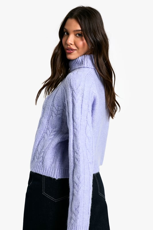Roll out in a roll neck jumper this season and gives that essential autumn uniform a cosy upgrade. If you want a fitted jumper with a high rolled collar which covers most of the neck, this is the collection for you. Warm, cosy and great for layering, slip into a chunky turtleneck jumper for days when you really want to keep the chill out. Hoping to cause a storm on the social calendar? Get brunch ready in bold roll necks, side split options and balloon sleeves something a little extra. Time not on your side? Grab your fave gilet and throw it over a classic black roll neck jumper. The high collar can be folded or rolled up to compliment your look. One thing's for sure casual and comfortable never looked so good.Style: JumperFabric: AcrylicLength: RegularNeckline: Roll NeckSleeve Length: Long Sleeve