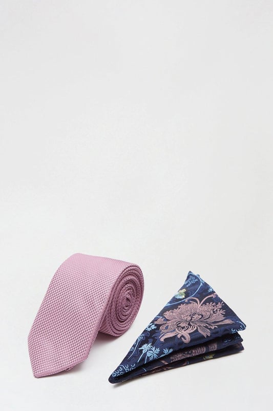 Complete the look with our collection of suit accessories. From classic bow ties, to lapel pins to braces and cuff links we've got everything you need to take suiting to the next level. Style: Pink Tie And Floral Pocket Set.  Ideal for: Occasion.  Design: Plain.  Model wears size UK 10 and is 5' 9" tall.