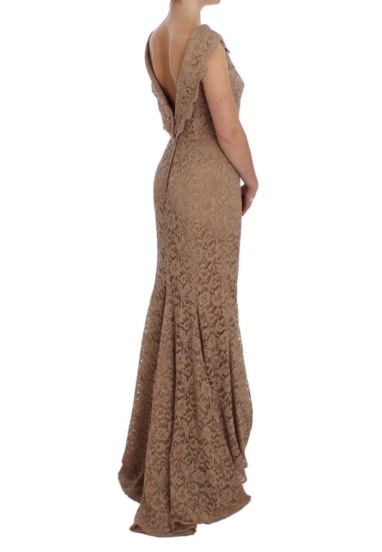Marke: Dolce & Gabbana  
Stil: Maxi-Sheath-Kleid  
Farbe: Pink  
Material: 55% Baumwolle, 20% Nylon, 25% Viskose  
Futter: 96% Seide, 4% Elastan  
Seidiger Stretch-Innenfutter für zusätzlichen Komfort  
Reißverschluss hinten für ein einfaches Anziehen  
Logodetails auf dem Kleid  
Hergestellt in Italien  