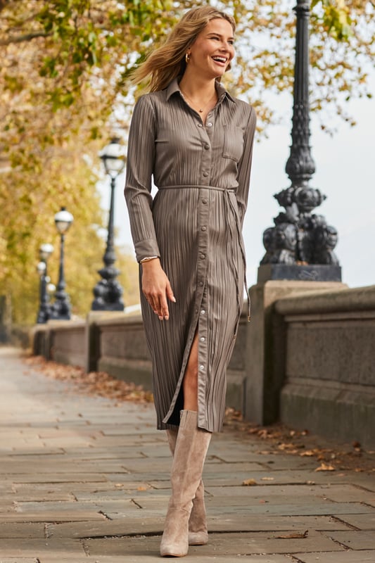 REASONS TO BUY:

A 'where did you get that dress?' dress
Crafted from the dreamiest plisse faux leather
Tie belt to cinch your waist
Shirt dresses are always in style
You'll wear it for work and play
We love it with suede knee-high boots