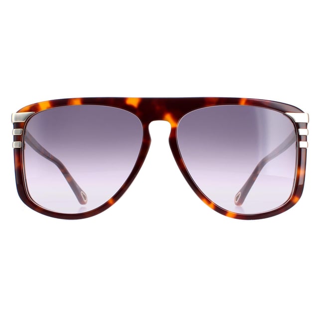 Las gafas de sol Chloe CH0104S 007 en degradado gris habana medio brillante son un moderno estilo aviador fabricado en acetato ligero. El logotipo de Chloe está grabado en las patillas finas para reconocer la marca.
