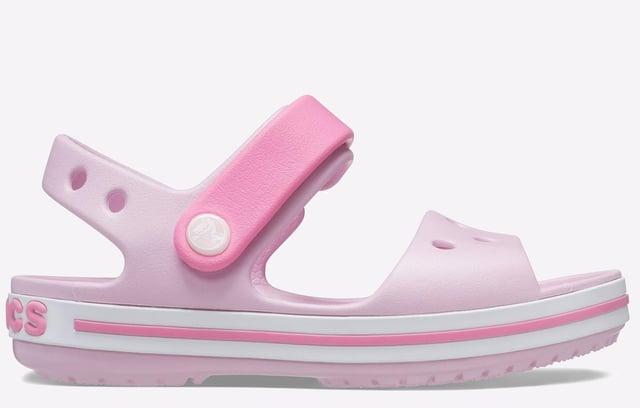 They will dazzle in our kids sandal with cute colours and a comfy fit. Jibbitz charm holes let them add a personal touch.
- Sporty Crocband style for little ones
- Croslite material cushions and comforts
- Heel and ankle strap for a more secure fit
- Comfort Rating: Iconic
