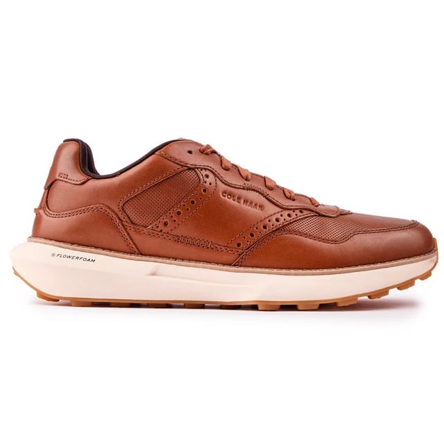 Descubra las nuevas zapatillas GrandPrø Ashland de Cole Haan, donde la ingeniería de precisión dentro de los detalles hechos a mano crea el equilibrio perfecto entre el estilo clásico de correr y el diseño brogue con la innovación de Cole Haan. Luce bien y siéntete bien con este versátil. De inspiración deportiva retro. Una zapatilla elegante para todo el día se combina con un zapato de vestir.