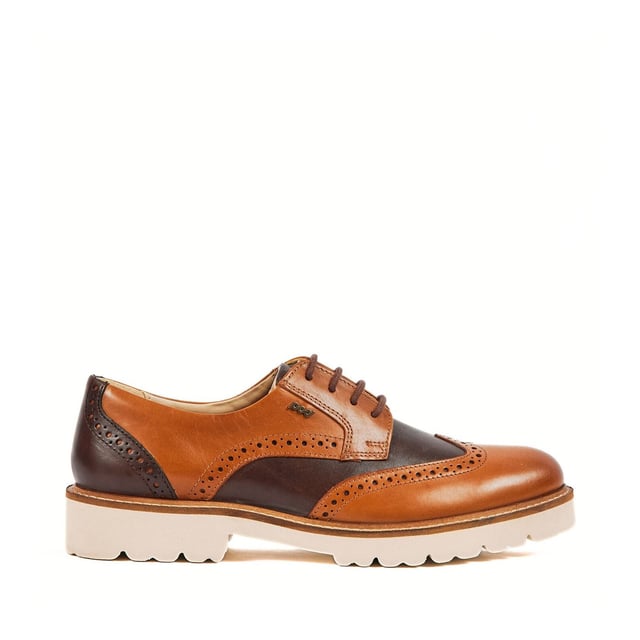 The KORTNEY is a timeless brogue style featuring subtle POD branding and sleek stitching details. The chunky sole gives an added edge to an otherwise classic style. The style is finished with tonal laces and blind eyelets
