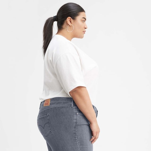 Jeans with clearance slimming panel