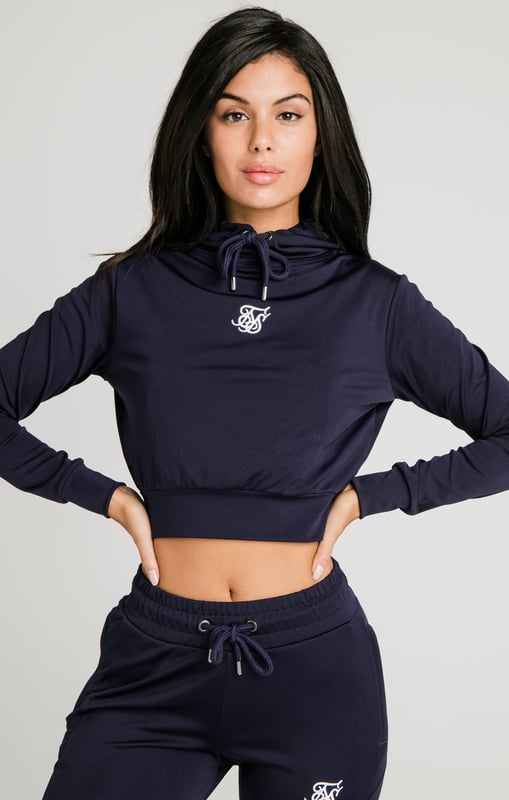 inchNavy Essential Track TopSoft touch fabricCropped lengthDrawstring hoodEmbroidered SikSilk logoLong sleevesStraight hemMachine wash95% Polyester 5% Elastane inch