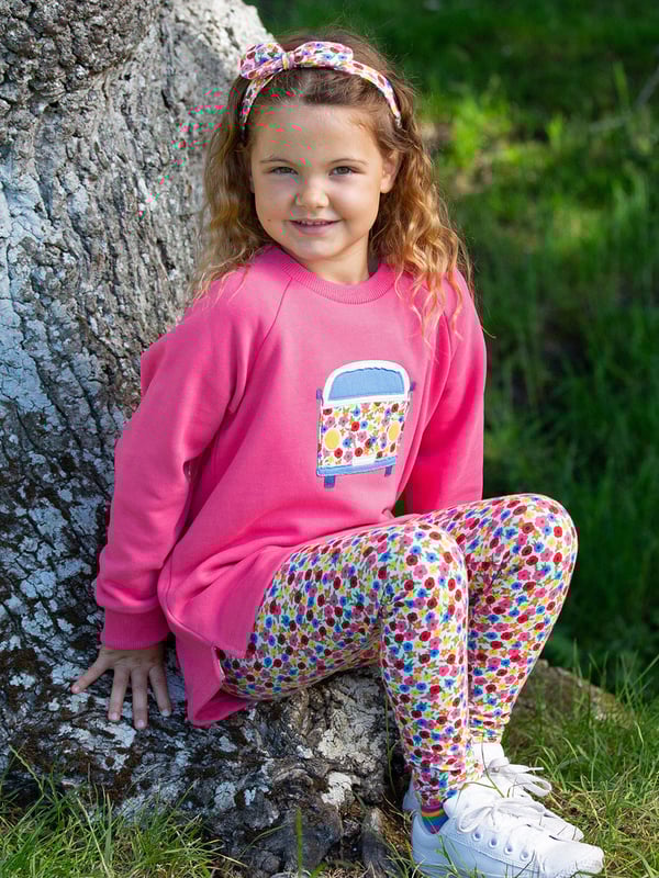 Hooray for today! Kite's let's go sweatshirt is the perfect companion for time spent adventuring and exploring. Stylish and practical with a lovely camper van appliqué on super-soft carmine pink brush back sweat fabric. What are you waiting for? Let's go!
