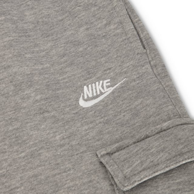 SOFT COMFORT. SIMPLE STYLE.

A wardrobe staple, the Nike Sportswear Club Fleece Crew combines a classic embroidered logo on the left of the chest with the soft comfort of fleece for an elevated everyday look.
The Nike Sportswear Club Fleece Cargo Trousers put an athletic spin on the classic cargo style. Made from soft brushed fabric, they're comfortable for all-day wear.
 
Soft Comfort
Brushed-back fleece is soft and smooth against the skin.

Secure Fit
Ribbing around the hem and cuffs ensures a secure fit.
Elastic waistband with an adjustable drawcord lets you personalise the fit. Elastic at the cuffs lets you show off your kicks.

Product Details
Standard fit for a relaxed, easy feel
Fabric: 80–82% cotton/18–20% polyester
Machine wash