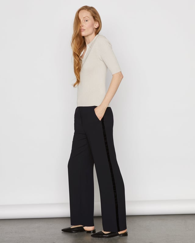 Luxe but relaxed, our velvet trim trouser are the must-have addition to your wardrobe this season. Featuring an elasticated back waistband and velvet tape on the side seams, these trousers marry comfort and style. Pair with a T-shirt for easy weekend dressing or, for a more formal look, team with a silk shirt and heels. 