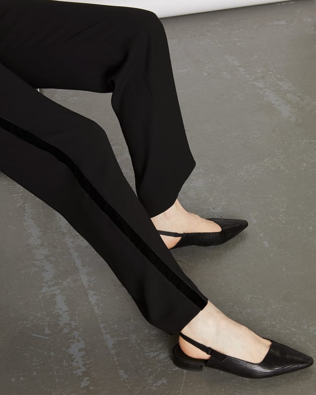 Luxe but relaxed, our velvet trim trouser are the must-have addition to your wardrobe this season. Featuring an elasticated back waistband and velvet tape on the side seams, these trousers marry comfort and style. Pair with a T-shirt for easy weekend dressing or, for a more formal look, team with a silk shirt and heels. 