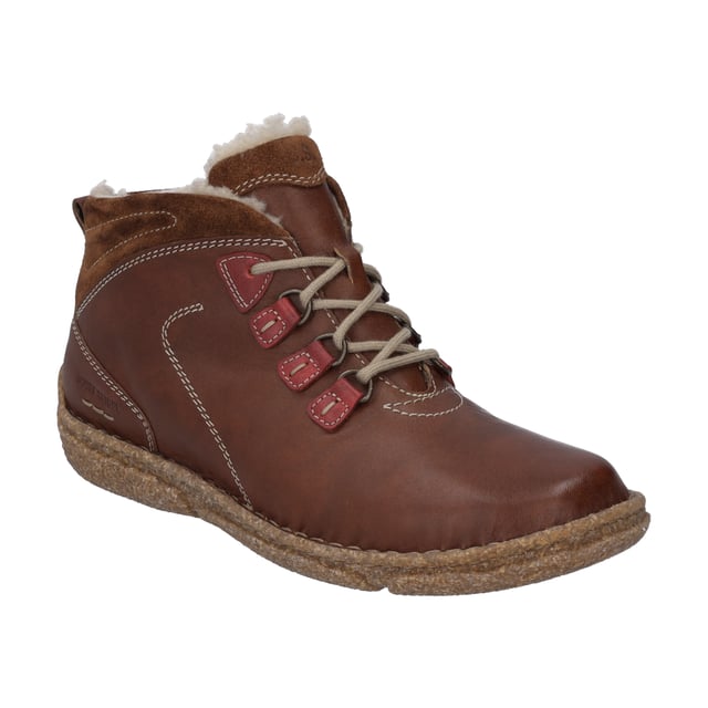 Herbst und Winter-Zeit ist Stiefeletten-Zeit. Genieße diese schöne Zeit im Jahr mit unserer braunen Damen-Stiefelette. Diese braune Stiefelette wird von uns aus einer geschmeidigen Leder-Kombination gefertigt. Die komfortable Schnürung gibt dem Fuß beim Gehen und Stehen besten Halt. Für die kalten Tage ist der Schuh mit hochwertigem Plüsch warm gefüttert. Die herausnehmbare Sohle kannst Du einfach wechseln. Die präzsie Handnaht zeichnet diese Stiefelette aus. Weite G ist die Komfortweite für alle normal gebauten Füße. Mit Neele 57 hast Du einen alltagstauglichen Begleiter für die Freizeit an Deiner Seite.