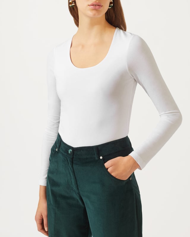This versatile long sleeved top is made from a soft stretch jersey. Styled with a flattering scoop neck and double-layer front for a flattering finish, we recommend layering this key capsule piece under a jacket for the office, or team with jeans for an easy weekend look.