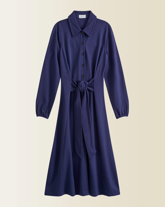 A new shape for Autumn Winter 19, this jersey dress has a shirt style upper and a fluid skirt. Designed with long sleeves, it has a front tie detail on the hips to create a feminine silhouette. Dress it up with our Daphine knee high boots or wear casually with leather trainers.