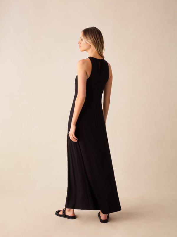 Co-founders' Notes

Our Black Jersey Racer Maxi Dress features a modern racer neckline and a soft-touch viscose blend jersey for a luxurious feel. This unlined dress is designed for easy wearing with a keyhole and button detail at the back neck, perfect for a quick and stylish outfit. With its chuck-on style and full maxi-length hem, this dress seamlessly combines comfort and contemporary flair.

Maxi length

Keyhole and button fastening at back
Unlined style
True to size. Try your usual size

  


Fabric &amp; Care



Composition: Main: 95% Viscose 5% Elastane


Garment Care: Machine washable



Size &amp; Fit


True to size. Try your usual size

Length: 143cm (size 10)

Model is 170 cm/5'7" and is wearing a size 10