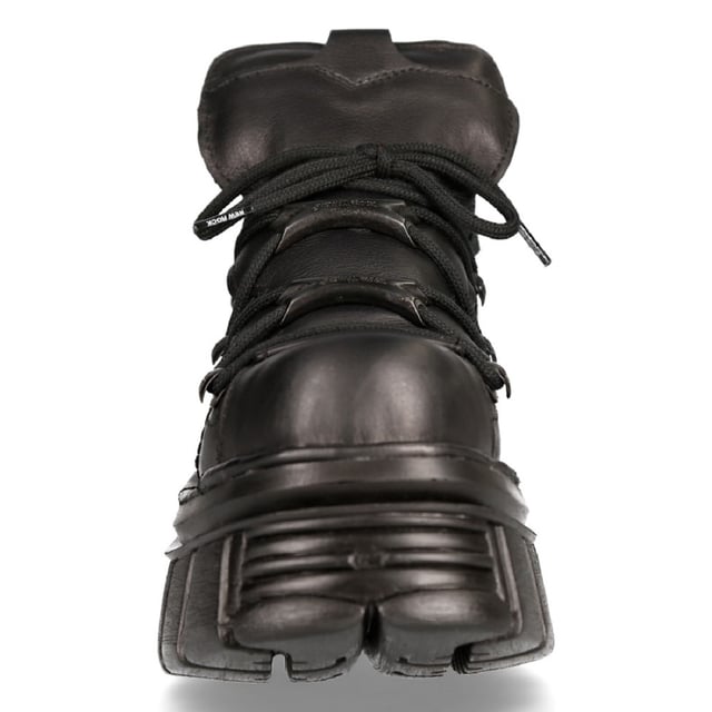Este estilo de botines de piel se ha convertido en sinónimo del nombre New Rock y de toda la calidad y el estilo por los que New Rock es aclamado internacionalmente. Este zapato se mantiene minimalista para una apariencia limpia y sencilla, con adornos metálicos sutiles en los cordones. Esta calidad minimalista se acentúa con la silueta atrevida de estos zapatos, que se han elevado a una altura de tacón de 8 cm y una altura de plataforma de 3 cm, creando una estética única y destacada. Con características adicionales que incluyen un forro interior de cuero suave, New Rock se ha asegurado de que este zapato mantenga una calidad elegante en el exterior y la máxima comodidad en el interior. • Altura del tacón: 8 cm• Altura de la plataforma: 3 cm• Altura de la caña: 10 cm• Cordones negros con adornos metálicos• Material exterior: piel de vacuno