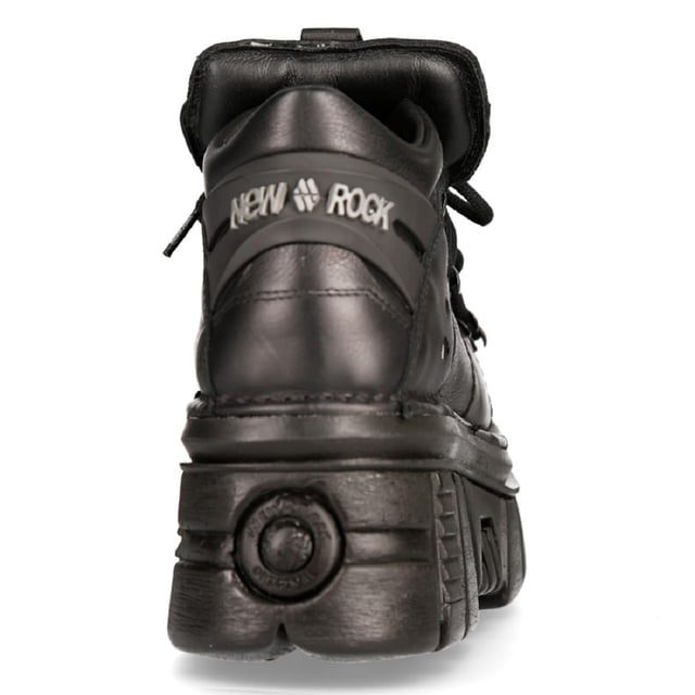 Este estilo de botines de piel se ha convertido en sinónimo del nombre New Rock y de toda la calidad y el estilo por los que New Rock es aclamado internacionalmente. Este zapato se mantiene minimalista para una apariencia limpia y sencilla, con adornos metálicos sutiles en los cordones. Esta calidad minimalista se acentúa con la silueta atrevida de estos zapatos, que se han elevado a una altura de tacón de 8 cm y una altura de plataforma de 3 cm, creando una estética única y destacada. Con características adicionales que incluyen un forro interior de cuero suave, New Rock se ha asegurado de que este zapato mantenga una calidad elegante en el exterior y la máxima comodidad en el interior. • Altura del tacón: 8 cm• Altura de la plataforma: 3 cm• Altura de la caña: 10 cm• Cordones negros con adornos metálicos• Material exterior: piel de vacuno