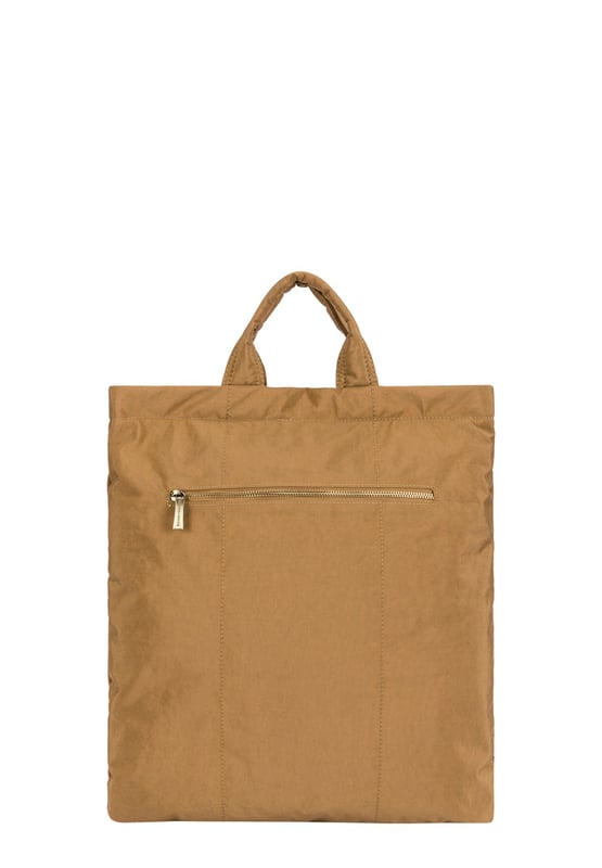 Made from our signature nylon, the Portrait Nylon Tote is the perfect way to carry all your everyday essentials. Featuring a padded carry handle and adjustable crossbody strap with a clip off function. Features: , Zip top opening, Front oversized flap over zip pocket, Rear zip pocket, SMITH & CANOVA antique brass logo, Branded antique brass zips, Padded grab handle, Adjustable crossbody strap (detachable), Internal 15 inch padded laptop sleeve, Internal zip pocket, 2 Internal mobile phone slip pockets - fits normal and plus size smart phones, 2 Internal pen slip pockets Style Ref: 92682 TAN