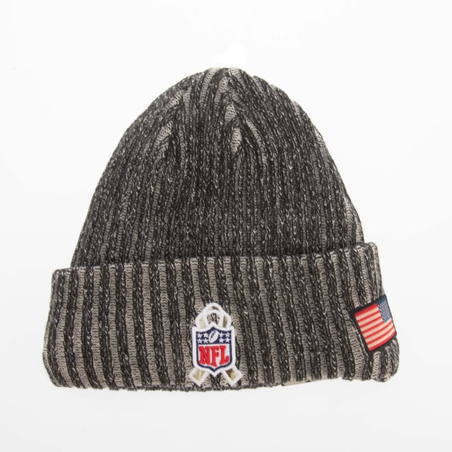 Mens New Era Jacksonville Jaguars NFL Salute to Service Bobble Knit Hat in black.- Turned hem.- Knitted.- Embroidered branding.- 100% Acrylic.- Ref: 60423695