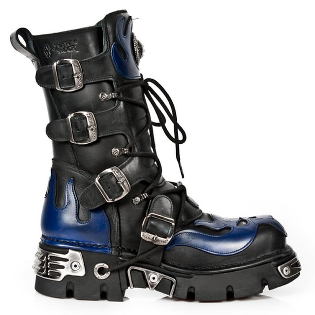 These mid-calf boots are crafted from premium cow hide leather and are finished with a quality that reflects the decades of experience in crafting premium footwear that New Rock has proudly amassed. This pair is characterised by a bold skull art piece and flame design that appears in blue on the black leather upper for a striking unique look that is sure to stand you out from the crowd. Another addition to the shoes distinctive look is a metallic motif that is created by the introduction of metal buckles, metallic inserts in the soles and an elegantly designed shiny New Rock logo. Not only is this a stunningly trendy piece but with the addition of a soft cushioned insole, comfortable leather lining and side zip opening these boots reach a level of comfort that will make you want to keep these mid-calves on all day.• Premium black leather uppers with blue skull feature• 23cm shaft height with side zip and metal buckles• 6cm rubber heel and 3cm sole