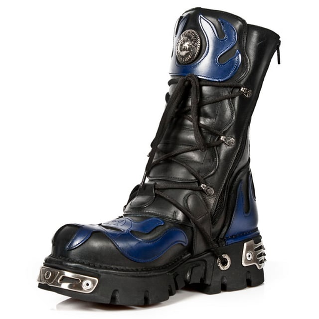 These mid-calf boots are crafted from premium cow hide leather and are finished with a quality that reflects the decades of experience in crafting premium footwear that New Rock has proudly amassed. This pair is characterised by a bold skull art piece and flame design that appears in blue on the black leather upper for a striking unique look that is sure to stand you out from the crowd. Another addition to the shoes distinctive look is a metallic motif that is created by the introduction of metal buckles, metallic inserts in the soles and an elegantly designed shiny New Rock logo. Not only is this a stunningly trendy piece but with the addition of a soft cushioned insole, comfortable leather lining and side zip opening these boots reach a level of comfort that will make you want to keep these mid-calves on all day.• Premium black leather uppers with blue skull feature• 23cm shaft height with side zip and metal buckles• 6cm rubber heel and 3cm sole