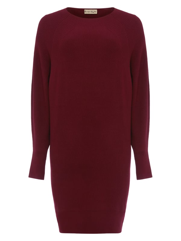 An effortless knitted tunic dress designed in an autumnal shade of port. Featuring a high neckline long sleeves and relaxed silhouette this flattering style looks great with skinny jeans and boots.