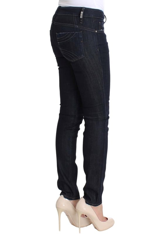 Merk: Costume National CNC
  Pasvorm: Slim fit skinny
  Kleur: Blauw
  Materiaal: 97% Katoen 3% Elastaan
  Gulp: Gulp met rits
  Zakken: Twee voor
  en twee achterzakken
  Details: Logo details
  Herkomst: Gemaakt in Italie