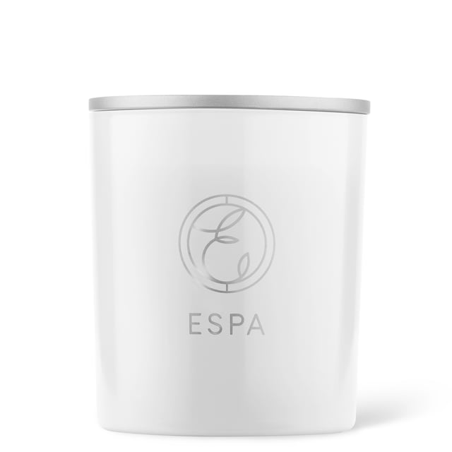 This hand-poured natural soy wax candle harnesses the power of essential oil aromatherapy. Restore tranquility, ease the mind and body, and transform your space into a sensorial haven.

Featuring The Soothing Signature Blend composed with mellow Myrrh, heady Rose Geranium, and warm Frankincense. Sink into serenity for the body and mind.

Housed in a timeless vessel, ensuring that your space is elegant. Beautifully created with white glass and finished with a chic metal lid. In a convenient 200g size.

Key Features:

Crafted from pure Essential Oils
100 percent Soy Wax
Hand poured
White glass Vessel
Convenient 200g size
