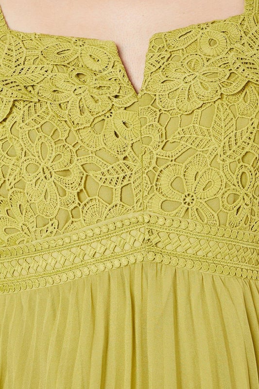 Exquisite lace bodice with intricate floral detailing
        Elegant square neckline for a sophisticated look
        Voluminous bishop sleeves add drama and flair
        Pleated chiffon skirt creates graceful movement
        Midi length perfect for formal occasions
    
    This stunning Coast dress combines timeless elegance with contemporary flair, making it an ideal choice for weddings, races, or any sophisticated soire. The lace bodice, adorned with delicate floral patterns, creates a captivating focal point, while the square neckline frames the dcolletage beautifully. The billowing bishop sleeves add a touch of romance and drama to the silhouette. The pleated chiffon skirt flows gracefully from the waist, offering both comfort and style as you move. To complete your ensemble, pair this dress with strappy metallic heels and delicate drop earrings. For a polished daytime look, layer with a tailored blazer and accessorise with a fascinator for the races. This versatile piece effortlessly transitions from day to evening events, ensuring you'll be the epitome of sophistication at any occasion.
