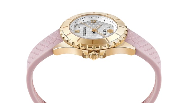 This Philipp Plein Plein Heaven Analogue Watch for Women is the perfect timepiece to wear or to gift. It's Gold 38 mm Round case combined with the comfortable Pink Silicone watch band will ensure you enjoy this stunning timepiece without any compromise. Operated by a high quality Quartz movement and water resistant to 5 bars, your watch will keep ticking. Philipp Plein’s Heaven watches represent the epitome of sophistication and technical mastery within the world of luxury timepieces. This Analogue watch has a  function: Luminous Hands High quality 19 cm length and 18 mm width Pink Silicone strap with a Buckle Case diameter: 38 mm,case thickness: 12 mm, case colour: Gold and dial colour: Silver