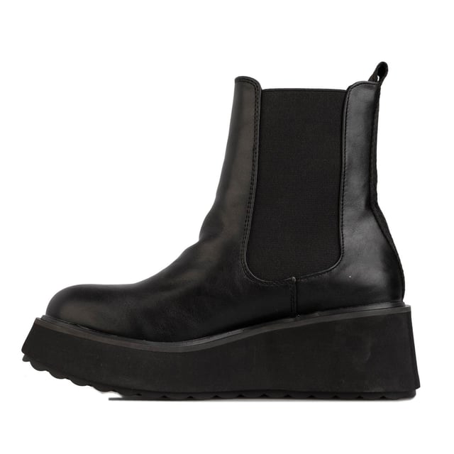 Botas altas Rocket Dog negras para mujer, confeccionadas en sintético y suela sintética. Características: altura de tacón 6 cm, forro textil, tirador en el talón, refuerzo elástico y tacón cuadrado.