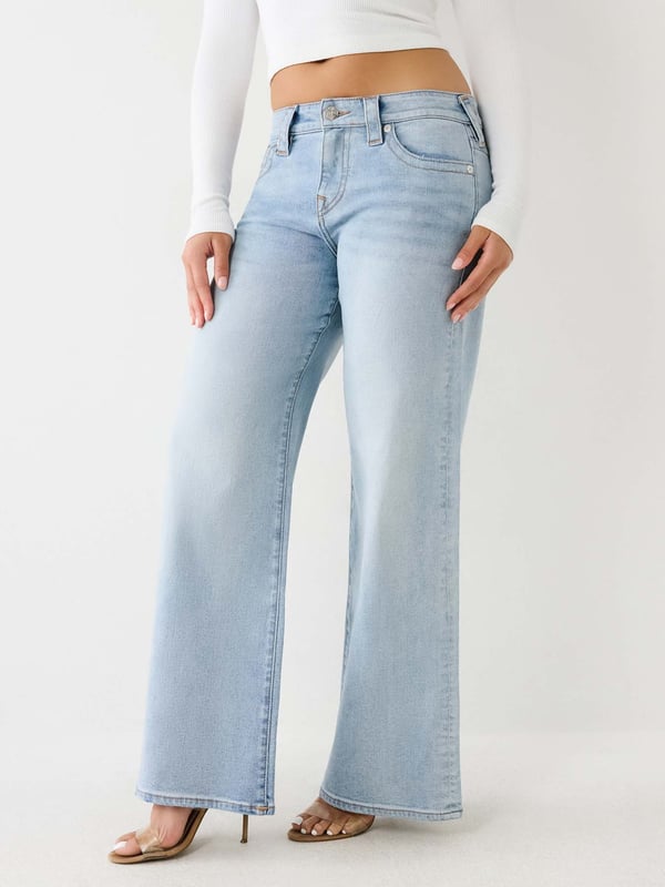 Relax your denim style with the Bobbi Baggy Jean. This relaxed fit women's baggy jean features fading, 3D whiskering, clean hardware, and classic gold stitching. Finished with 1/2" horseshoe detailing along the back pockets.    