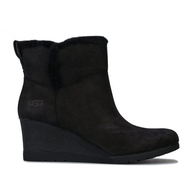 Womens UGG Australia Devorah Boots in black.<BR><BR>- Waterproof suede upper with seam-sealed construction.<BR>- Almond shaped toe.<BR>- Pull-on loop for easy on-off.<BR>- Soft sheepskin lining.<BR>- UGGpure wool insole.<BR>- Wedge heel.<BR>- Flexible White Spider Rubber outsole.<BR>- Debossed UGG branding to side.<BR>- Wedge height: 2.5in approximately.<BR>- Shaft height: 4.5in approximately.<BR>- Suede upper  Textile lining  Rubber sole.<BR>- Ref: 1103824<BR><BR>Measurements are intended for guidance only.<BR><BR>We sell genuine UGG® boots.  These are only available in half sizes.  Therefore if you were to order a size 5 we shall send you a 5.5 which we know from experience will be the best fit.