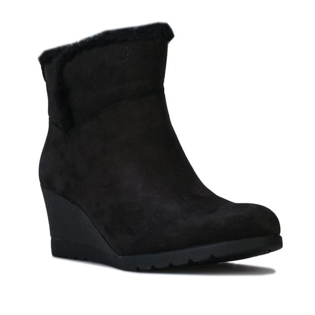 Womens UGG Australia Devorah Boots in black.<BR><BR>- Waterproof suede upper with seam-sealed construction.<BR>- Almond shaped toe.<BR>- Pull-on loop for easy on-off.<BR>- Soft sheepskin lining.<BR>- UGGpure wool insole.<BR>- Wedge heel.<BR>- Flexible White Spider Rubber outsole.<BR>- Debossed UGG branding to side.<BR>- Wedge height: 2.5in approximately.<BR>- Shaft height: 4.5in approximately.<BR>- Suede upper  Textile lining  Rubber sole.<BR>- Ref: 1103824<BR><BR>Measurements are intended for guidance only.<BR><BR>We sell genuine UGG® boots.  These are only available in half sizes.  Therefore if you were to order a size 5 we shall send you a 5.5 which we know from experience will be the best fit.