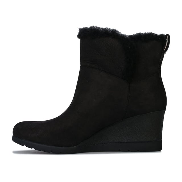 Womens UGG Australia Devorah Boots in black.<BR><BR>- Waterproof suede upper with seam-sealed construction.<BR>- Almond shaped toe.<BR>- Pull-on loop for easy on-off.<BR>- Soft sheepskin lining.<BR>- UGGpure wool insole.<BR>- Wedge heel.<BR>- Flexible White Spider Rubber outsole.<BR>- Debossed UGG branding to side.<BR>- Wedge height: 2.5in approximately.<BR>- Shaft height: 4.5in approximately.<BR>- Suede upper  Textile lining  Rubber sole.<BR>- Ref: 1103824<BR><BR>Measurements are intended for guidance only.<BR><BR>We sell genuine UGG® boots.  These are only available in half sizes.  Therefore if you were to order a size 5 we shall send you a 5.5 which we know from experience will be the best fit.