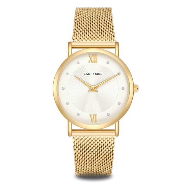 GENERAL INFORMATION:  • Targetgroup: Female  • Wristwatch: No Special Functions  • Display: analogue  • Weight of watch w/o box (gr.) - approx.: 48,0  MOVEMENT:  • Movement: Quartz  • Term of Movement: 2025  • Origin of movement: Japan  BRACELET:  • Material of bracelet/strap: Stainless steel  • Plating of bracelet/strap: Ion-Plating (IP)  • Finishing of bracelet/strap: Smooth  • Finishing/Decoration of bracelet/strap: None  • Clasp/Closure/Buckle: Slide Clasp  • Color of bracelet/strap: Yellowgold  • Length of bracelet/strap (mm) approx.: 200,0  • Width of bracelet/strap (mm) approx.: 17,6  • Style/Design of bracelet/strap: Mesh band (Millanaise Style)  • Bracelet/strap adjustable?: No  CASE:  • Shape of case: Round  • Size/Diameter of case in mm . approx.: 33,0  • Height of case in mm: 6,7  • Case material: Metal (Alloy)  • Surface of case: Polished  • Bezel/Topring: Fixed  • Finishing/Decoration of case: None  • Material of case back: Stainless steel  • Lock of case back: No screwed-in crown  • Color of case: Yellowgold  • Coating/Plating (Case): Ion-Plating (IP)  • Type/Form of crystal: Flat  • Material of crystal: Mineral crystal  • Water resistant (ATM): 3  DIAL:  • Size jewelry care cloth: Hour, Minute  • Indices: Roman numerals/points  • Material of dial: Brass  • Structure/pattern of dial: sunray  • Color of dial: White  PUSHER, CROWN, HAND:  • Pusher: None  • Corrector: No  • Crown: No screwed-in crown  • Type of hands: Dauphine hands  • Luminescent (hands): No  PACKAGING & SCOPE OF DELIVERY:  • Box: Yes  • Service booklet: Yes  • Manual: Yes