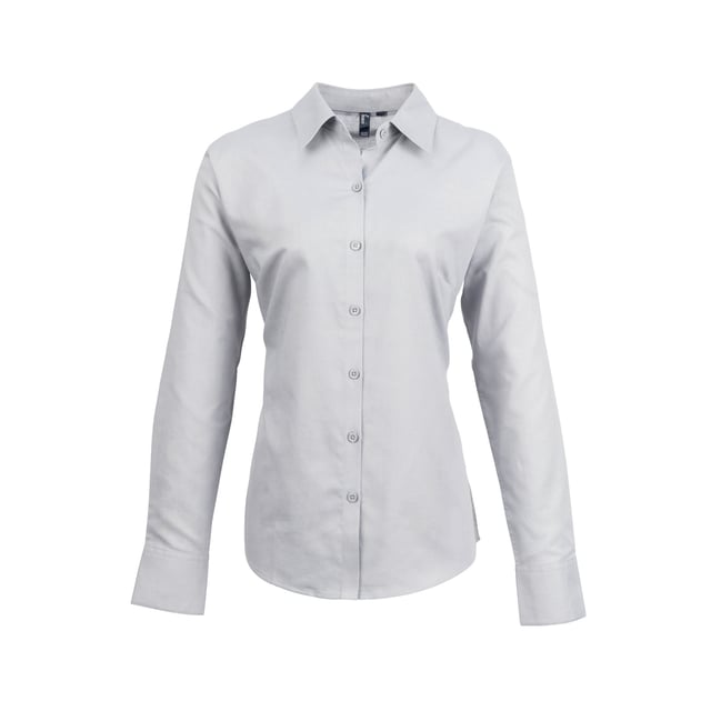 Ladies signature Oxford long sleeve Easycare blouse with wrinkle free finish for a smart and professional appearance. Soft collar styling. Rounded bottom hem. Fitted styling with bust and back darts. Pearlised buttons on light blue and white shirt, self c. Fabric:70% Cotton, 30% Polyester, cotton rich Oxford weave Weight: 135gsm. 8, 10, 12, 14, 16, 18, 20, 22, 24