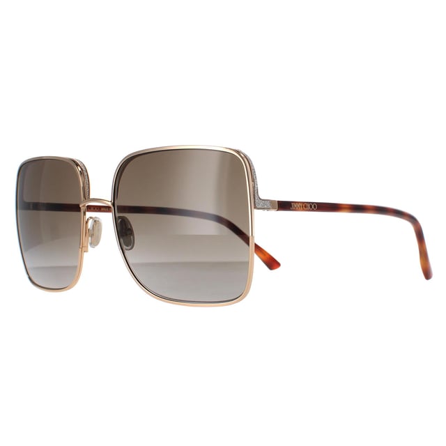 Jimmy Choo Square Womens Gold Havana Brown Gradient ALIANA/S  Sunglasses are sleek square frame, enhancing your facial features while providing optimal sun protection. The high-quality metal material used in their construction ensure durability and comfort, making them the ideal companion for both everyday wear and special occasions. The Jimmy Choo logo features on the slender temples for brand authenticity.