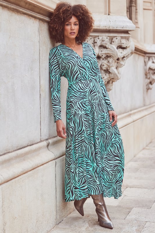 Fuel your animal print obsession
Wrap design to cinch your waist
Pleat detail hem swishes beautifully
Batwing sleeves create a standout silhouette
For brunch or a big night out
Think platforms for dancing, knee-highs for day-to-night chic