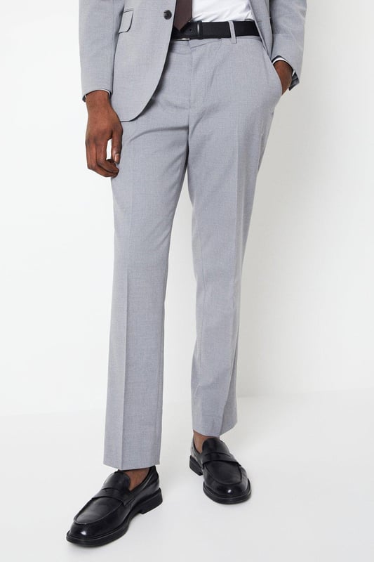 Introducing our Essential Tailored Fit Smart trousers, a must-have addition to your wardrobe. These trousers features a zip fly fastening for convenience and is designed to provide a sleek and polished look. Made with a polyester viscose blend with added stretch ensures a cool and comfortable fit all day long. Pair these versatile trousers with matching items, perfect for any smart occasion.