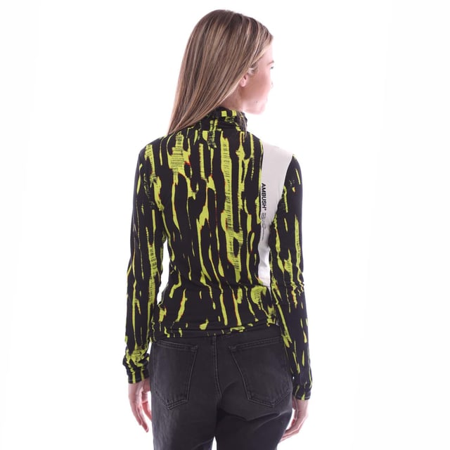 Ambush Printed Fitted Long Sleeve Turtleneck Top in yellow.- Turtleneck.- Long sleeves.- All-over abstract print.- Printed on the side.- 95% Viscose  5% Elastane.- Ref: BWAD0370016500