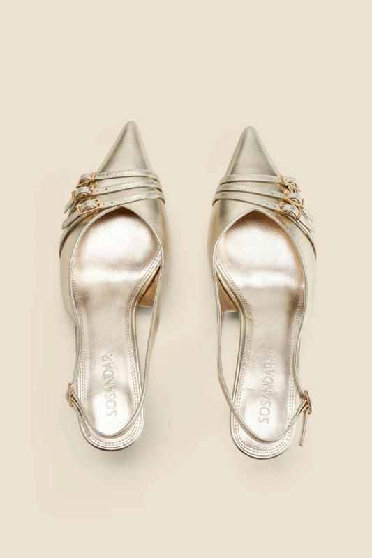Luxe up your lookTimeless slingback style with a sleek pointed toeSet on a comfy-chic kitten heel Elevated with a statement buckle strap detail Adjustable strap for the perfect fit Dress them down with denim, up with